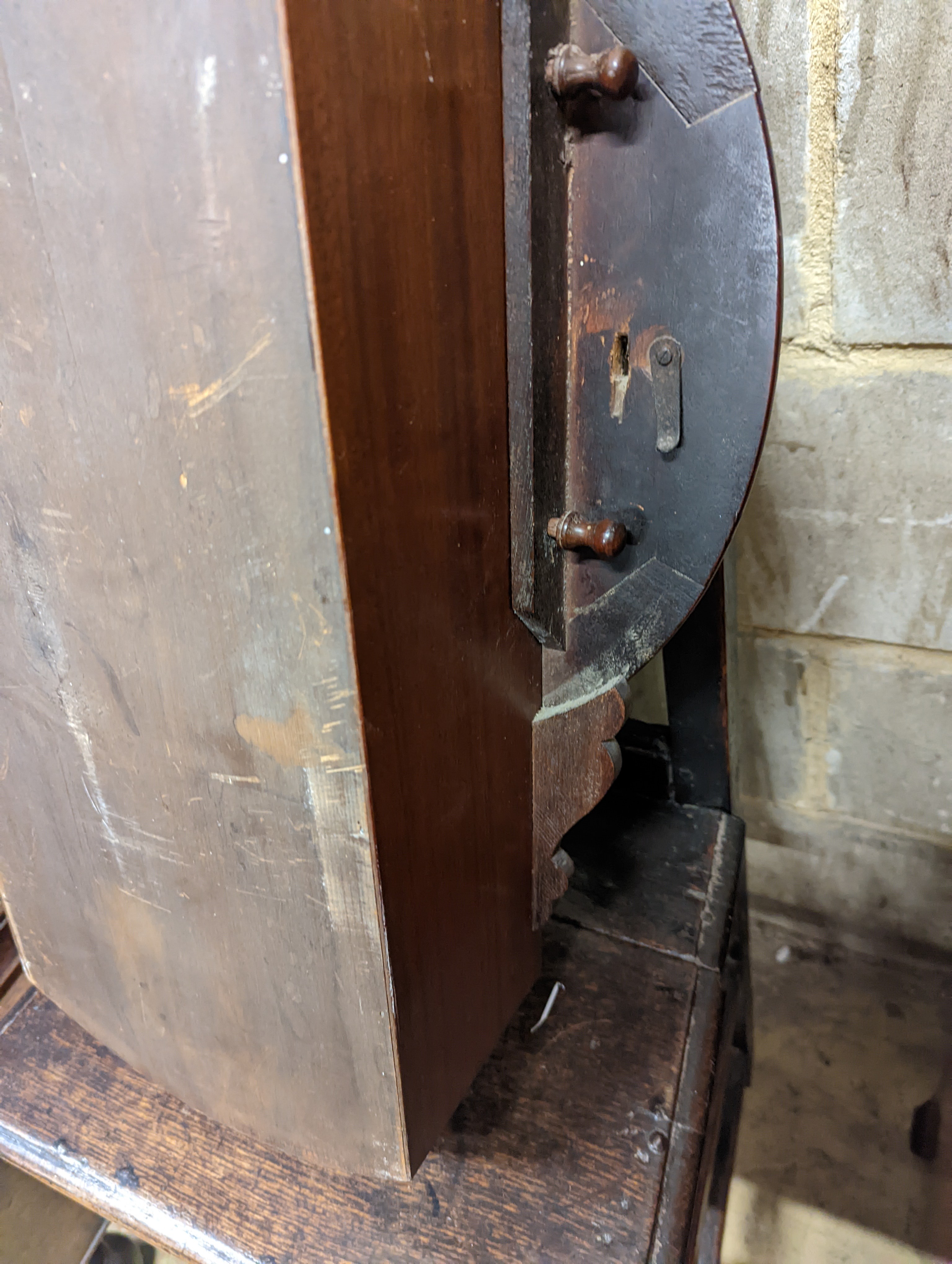 A Victorian mahogany drop dial wall clock, with twin fusee movement, and circular white painted Roman dial signed 
